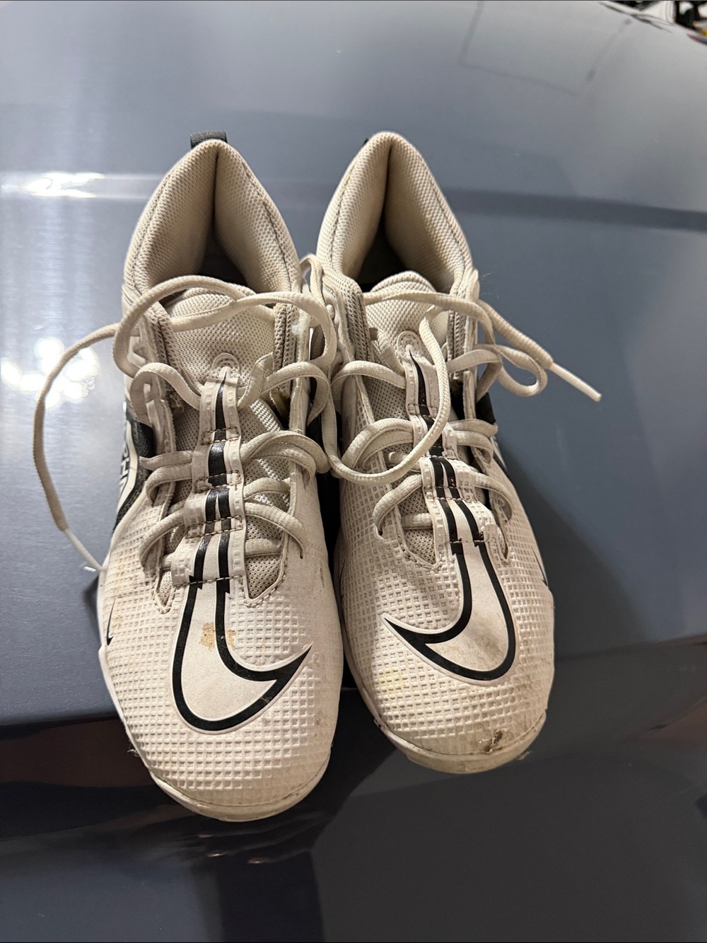 Nike White football cleats with Black Swoosh Accents